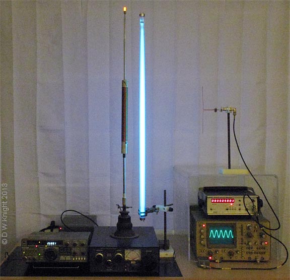 Normal mode helical resonator with nearby Hg vapour tube. Quarter-wave resonance.