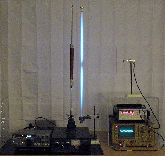 Normal mode helical resonator with nearby Hg vapour tube. 3/4 wave resonance with node.